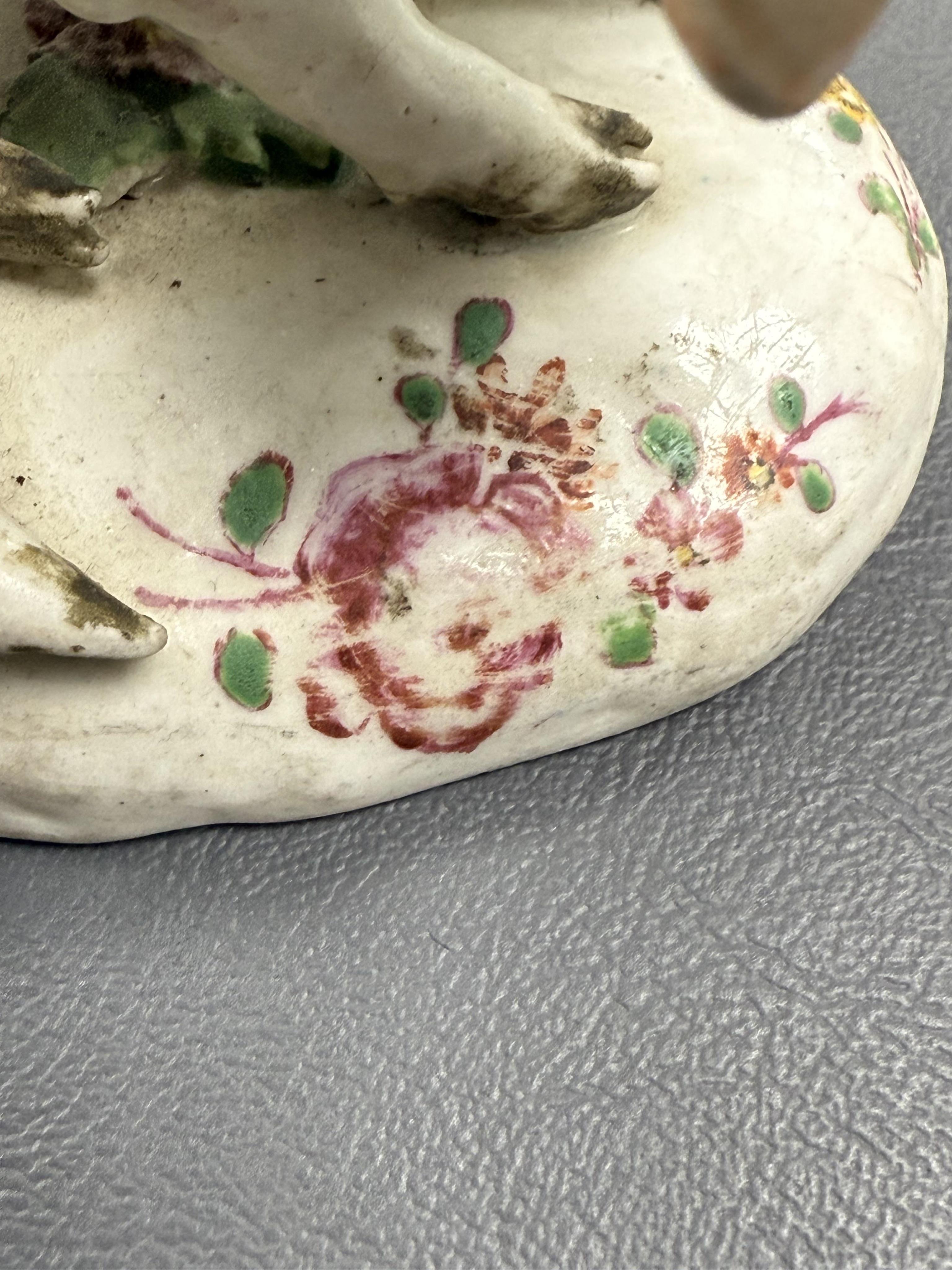 A pair of early Derby porcelain models of wild boars, c.1752-55